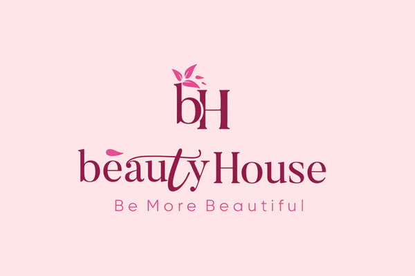 Logo of beautyHouse with pink text on a black background